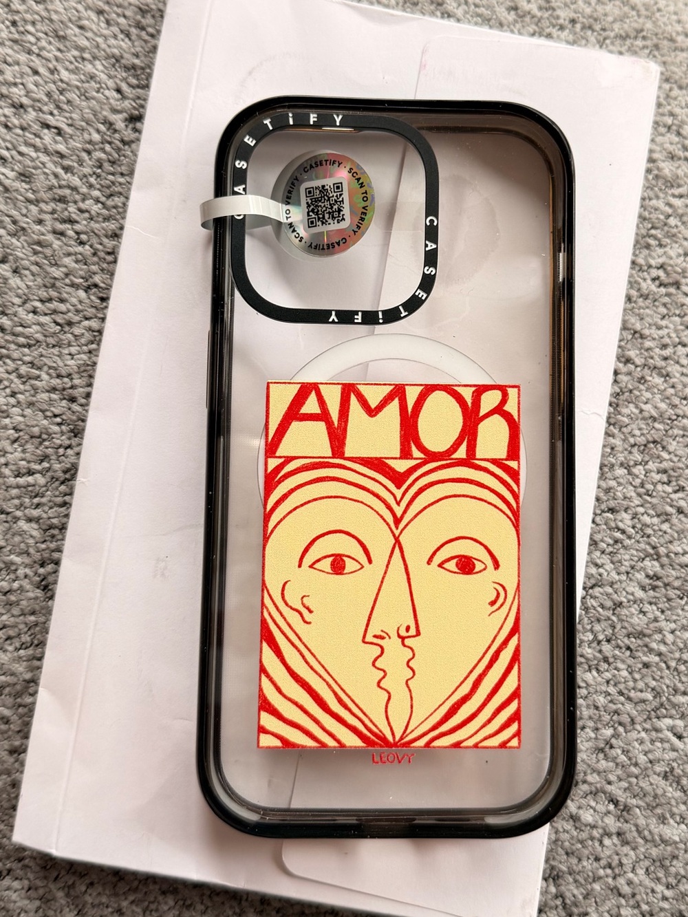 Casetify Clear Case with Black Bumper and Red & Cream AMOR Card